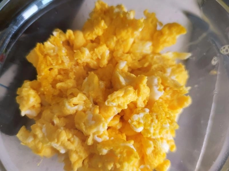Fluffy scrambled eggs for authentic Yangzhou Fried Rice recipe